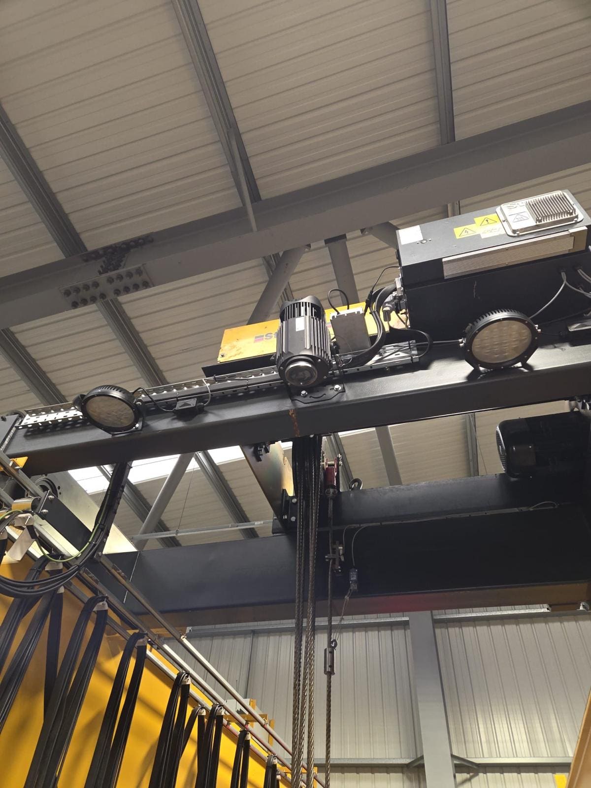 Gantry crane overhead projector to highlight danger zone below